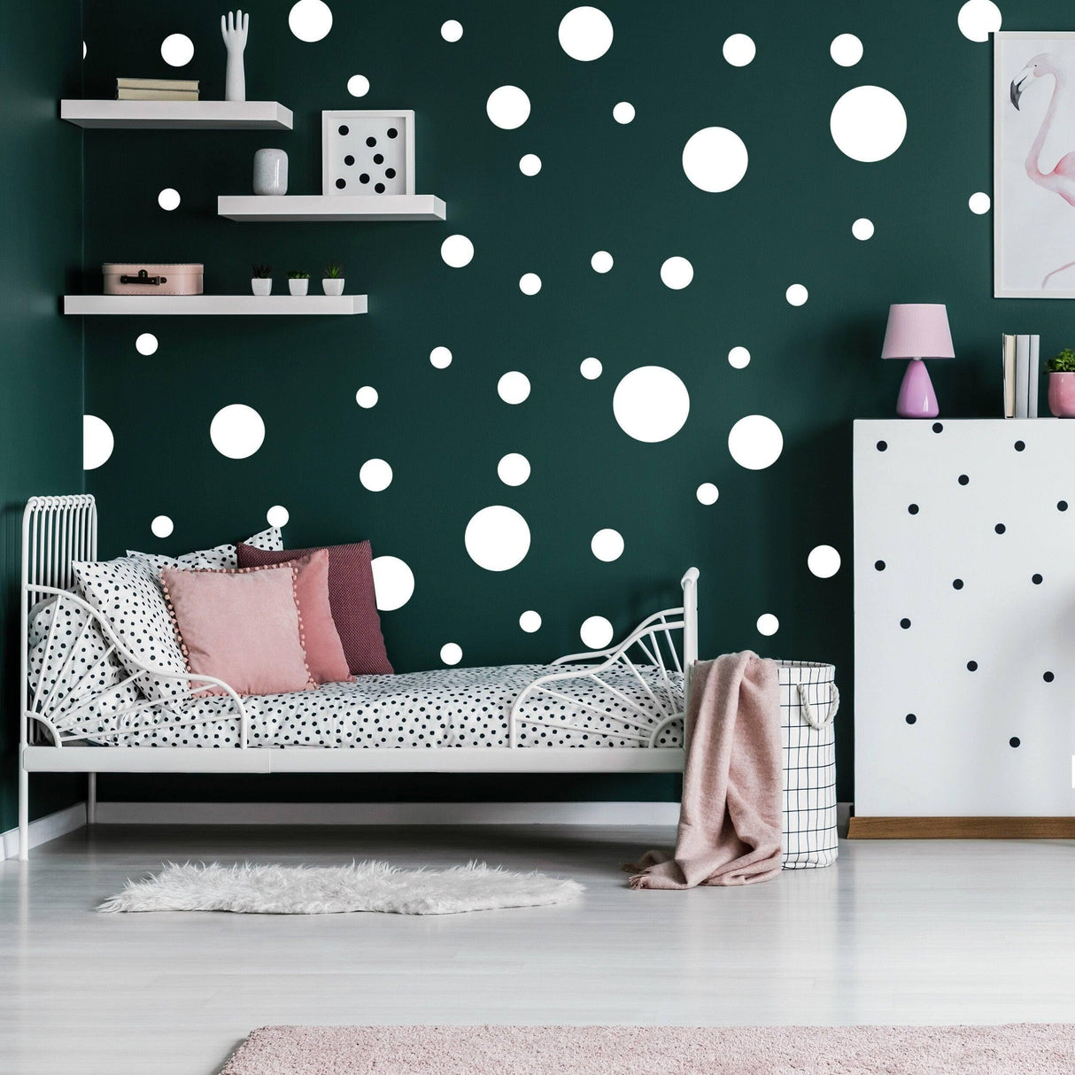 Cozy room with white round dot stickers on dark green wall, featuring a stylish bed and decor.