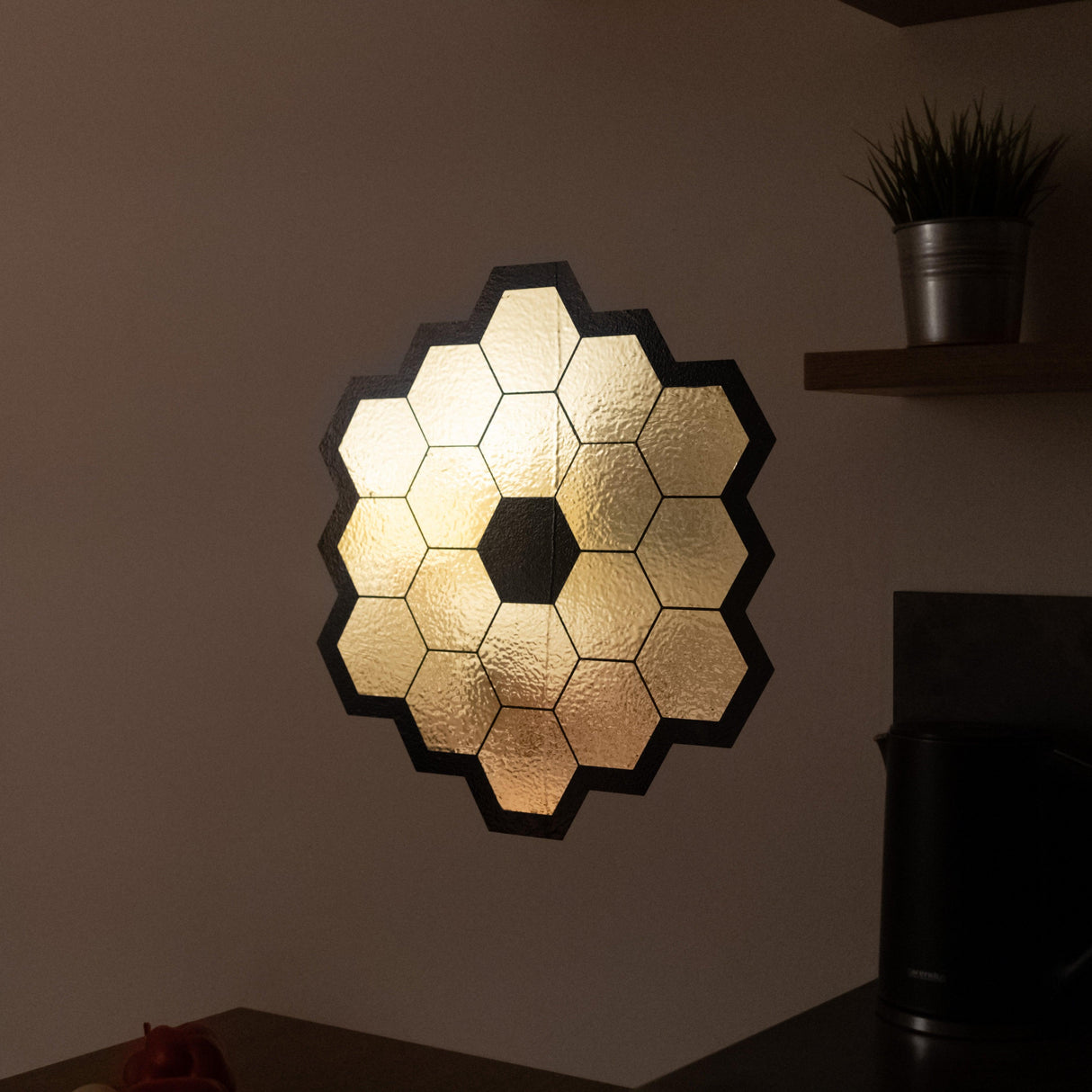 James Webb Space Telescope mirror wall sticker in gold chrome vinyl, perfect for space-themed decor.