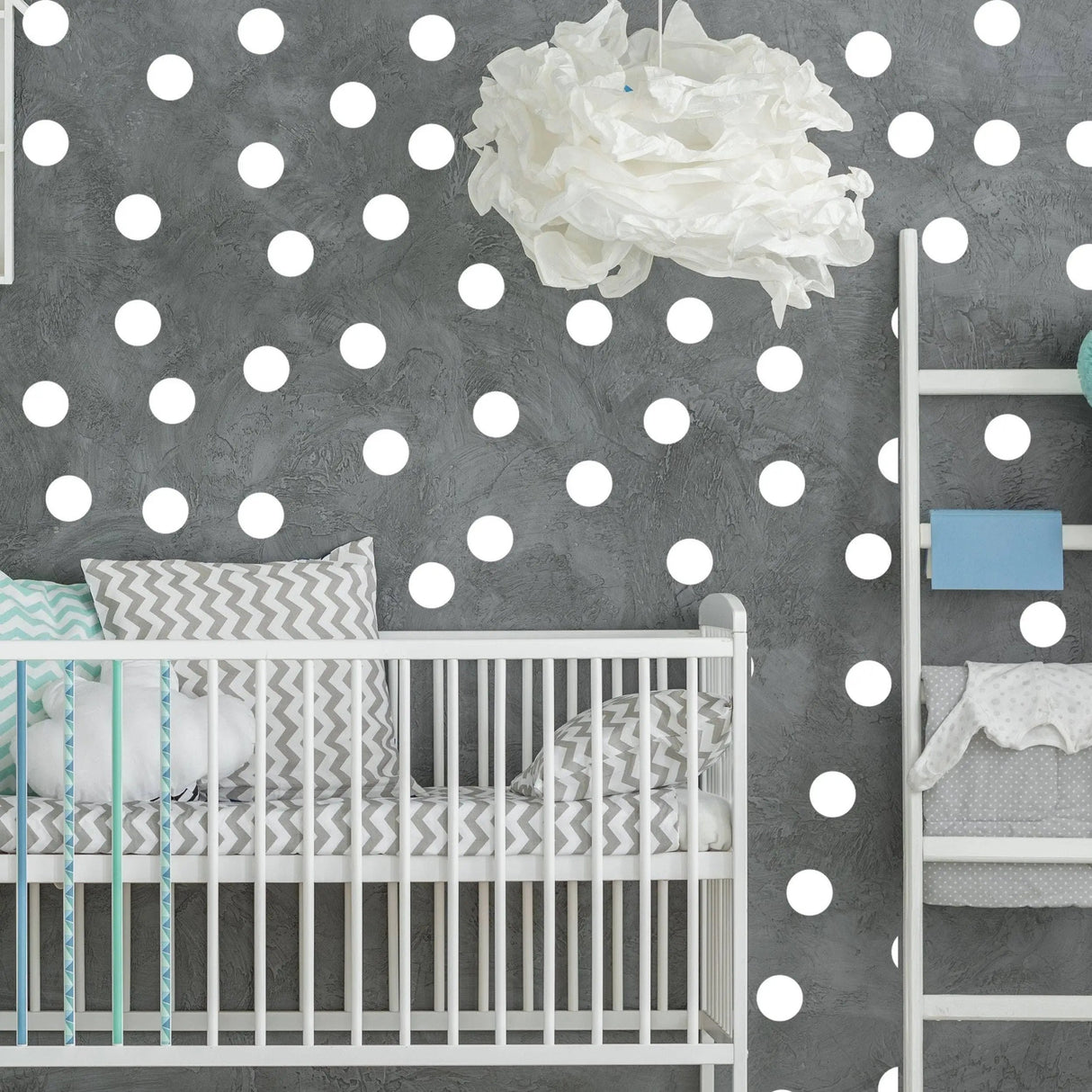 White round circle dot stickers on a nursery wall, creating a cozy and creative decorative atmosphere.