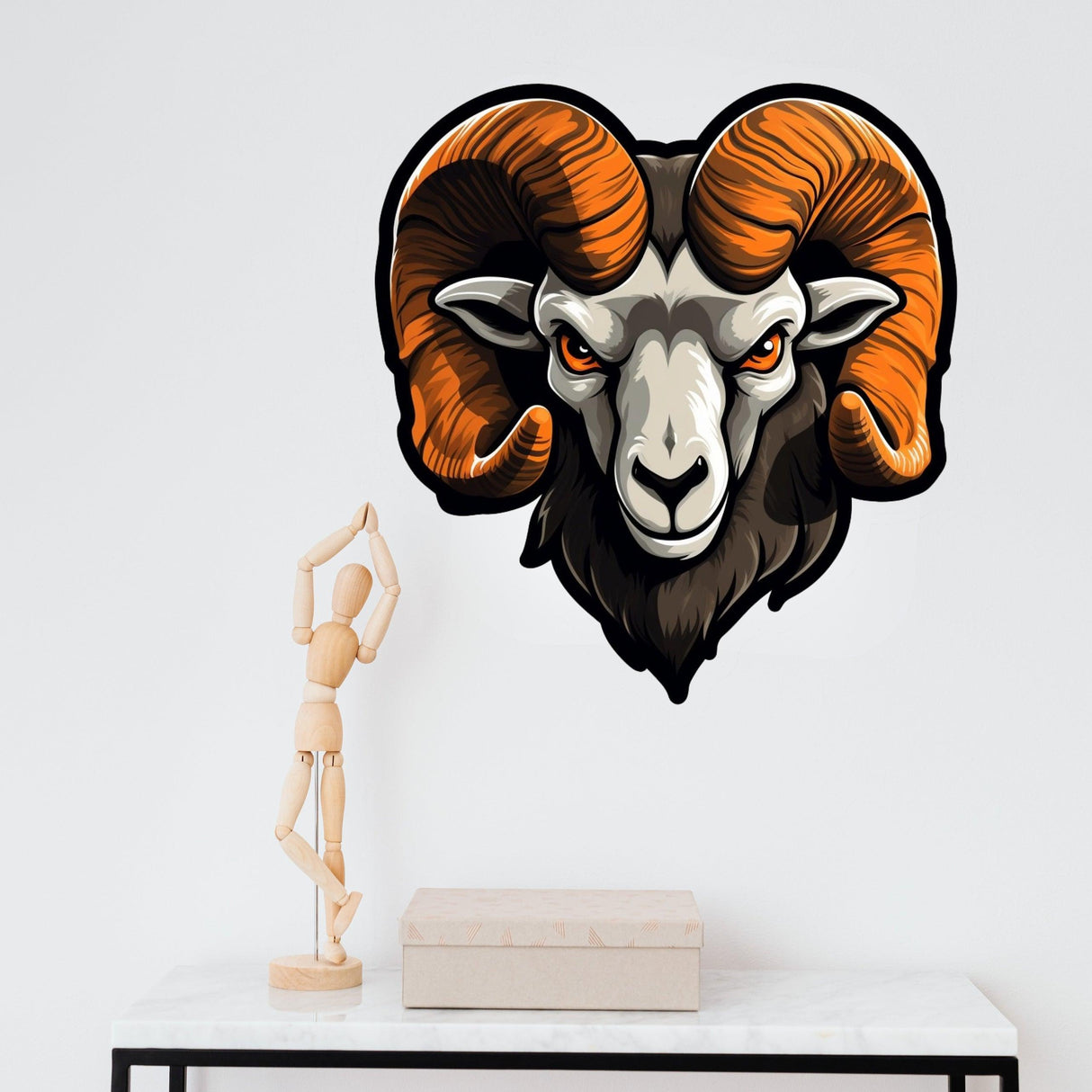 Artistic ram head wall sticker featuring glossy brown horns and a piercing gaze, ideal for stylish room decor.