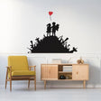 Urban design wall decal featuring two children on a hill holding a balloon, enhancing modern interior decor.