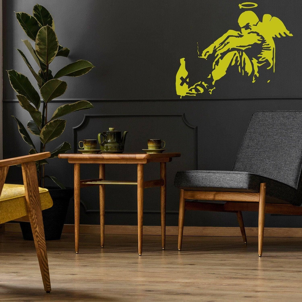 Urban wings designer vinyl decal of a fallen angel on a dark wall, enhancing modern interior decor.