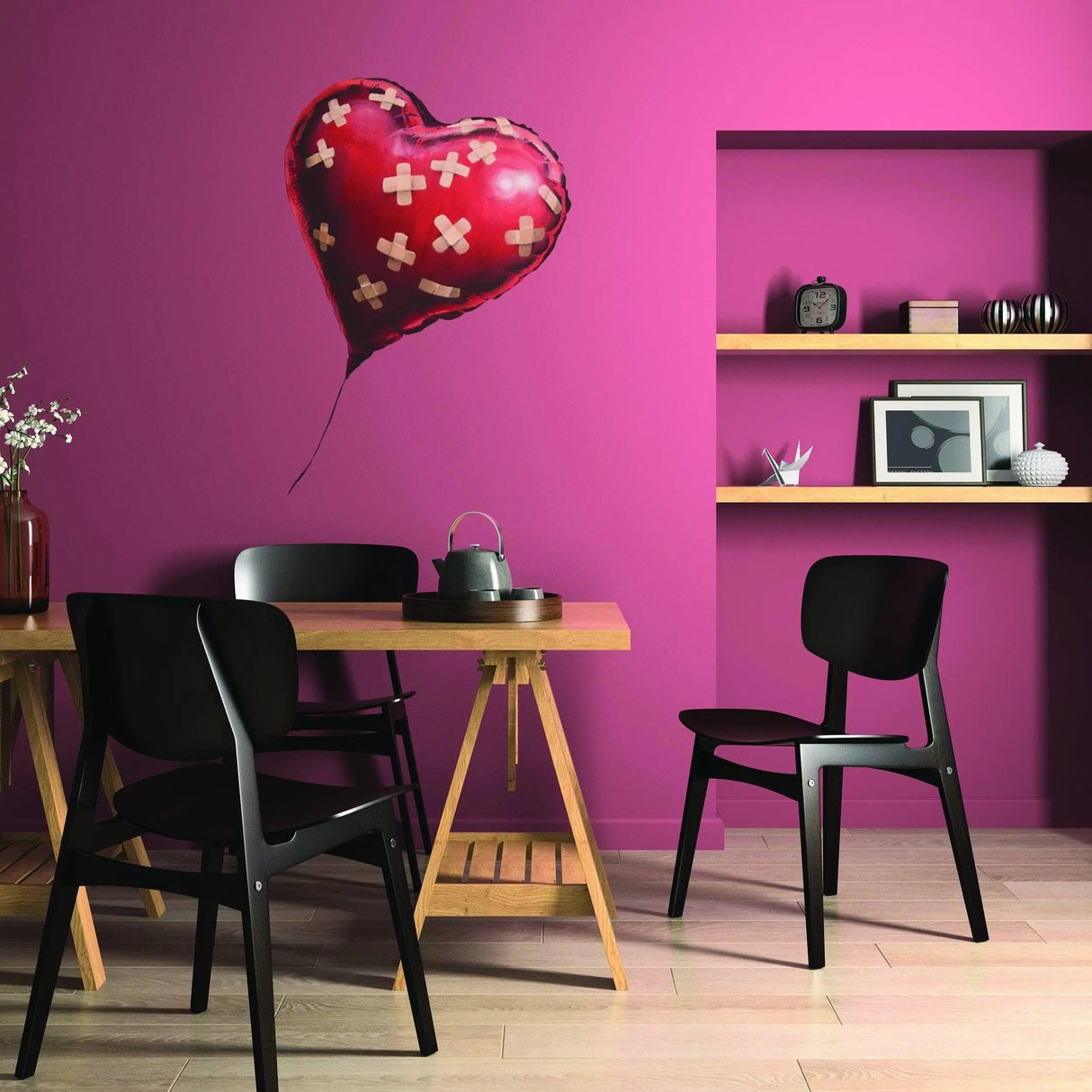 Stylish heart balloon wall sticker on pink wall in modern dining space, adding urban chic decor.
