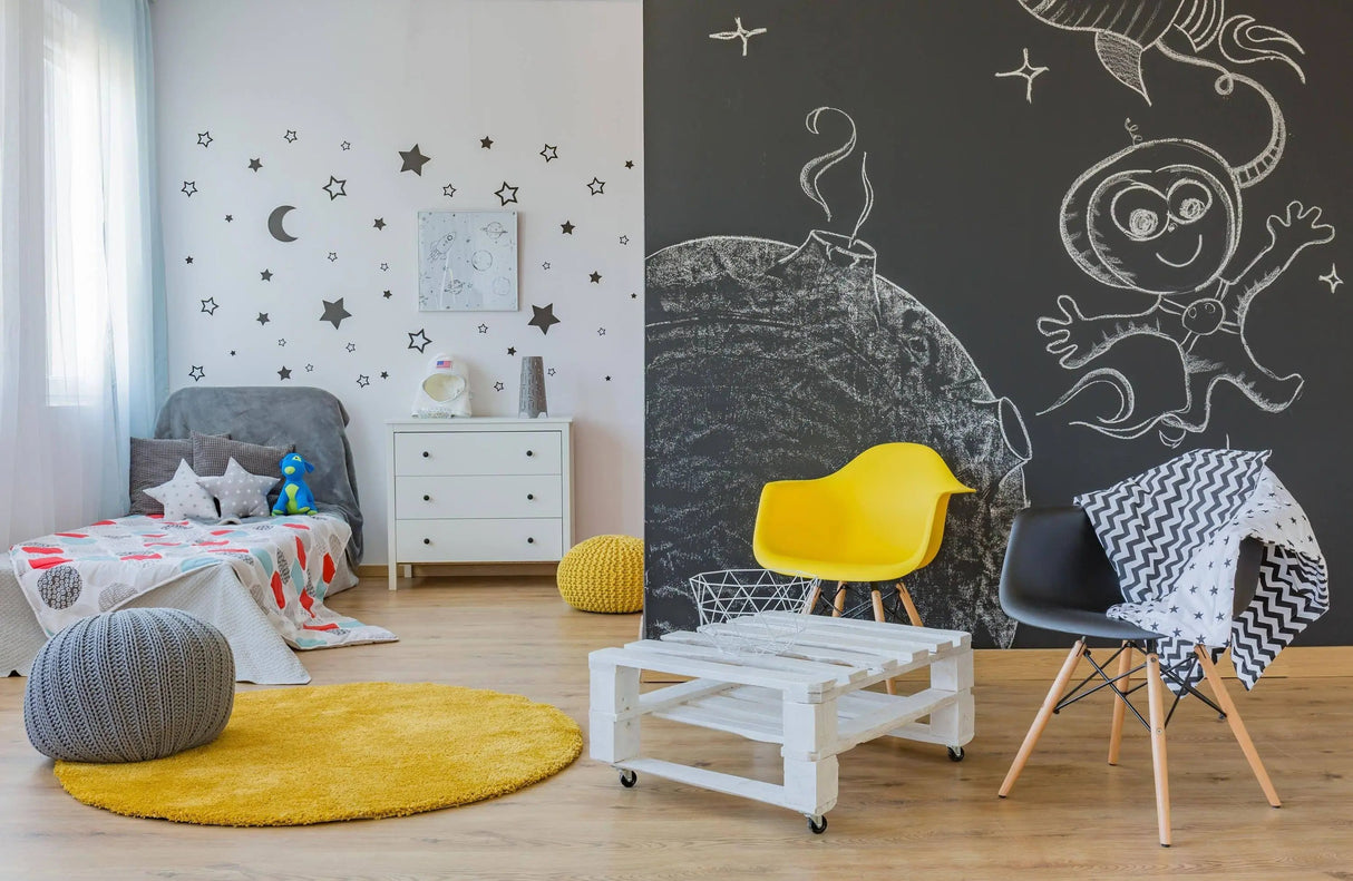 Stylish children's room with creative chalkboard wall design and colorful decor elements.