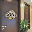 Vinyl logo door sticker featuring a tiger emblem, personalized for the Wests Tigers, enhancing office decor.