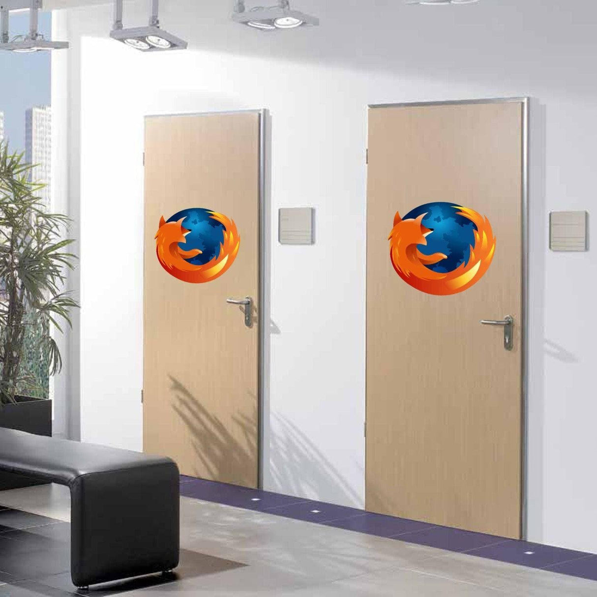 Personalized office doors with custom vinyl Firefox logo decals in a modern workspace.
