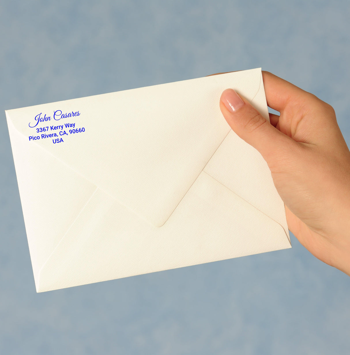 Custom clear mailing label on an envelope, showcasing a personal touch for stylish postage.