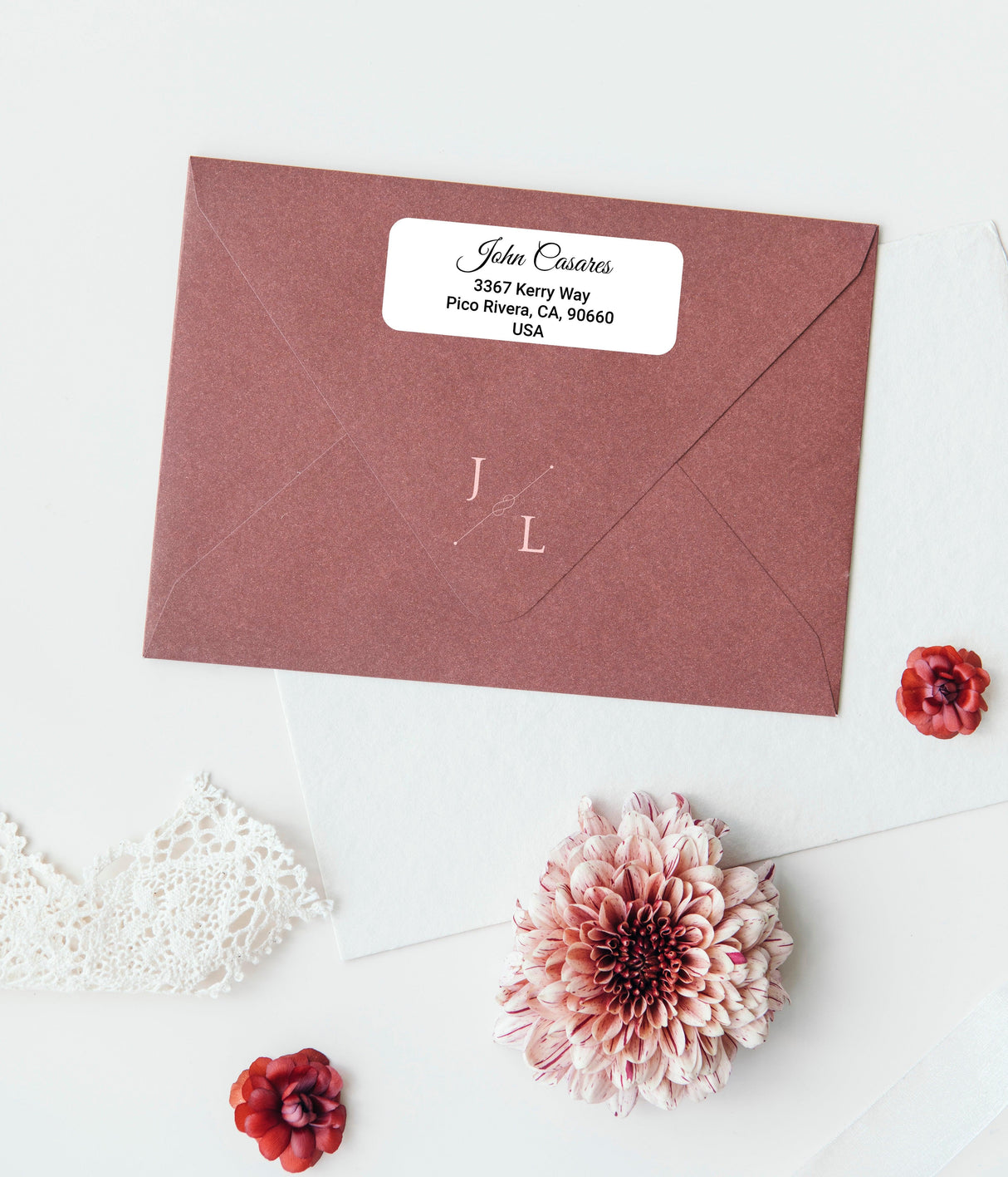 Custom clear mailing label on a stylish brown envelope, featuring personalized address design.