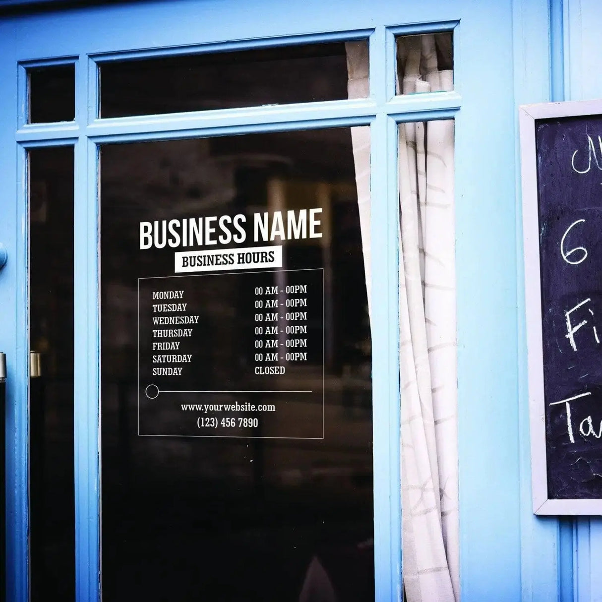 Personalized vinyl business hours decal displayed on a storefront window.