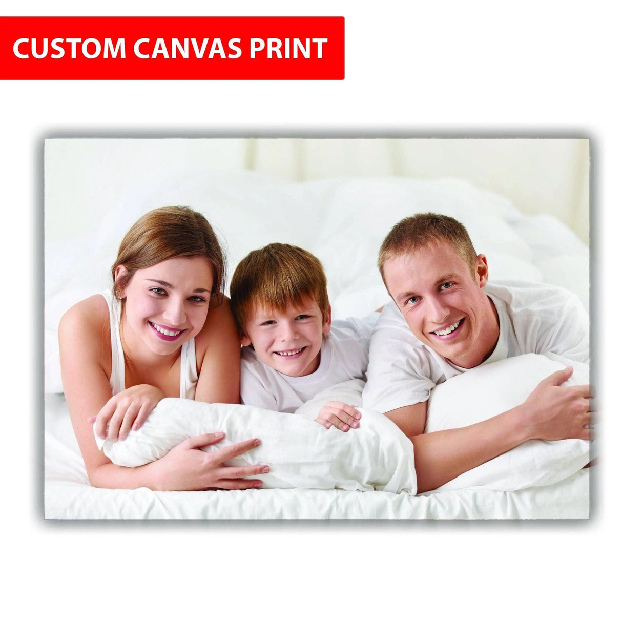 Personalized canvas print showcasing a happy family portrait on a cozy bed.
