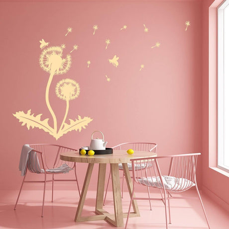 Dandelion vinyl sticker wall decal on pink wall, enhancing a modern dining space with nature-inspired decor.