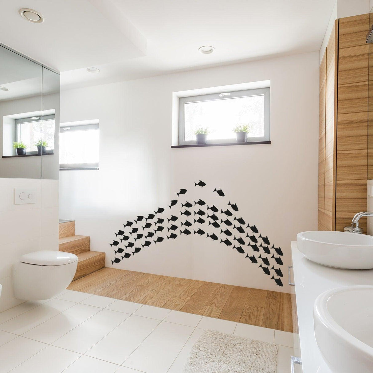 Underwater oasis wall decal set featuring a school of black fish, perfect for transforming bathroom decor.
