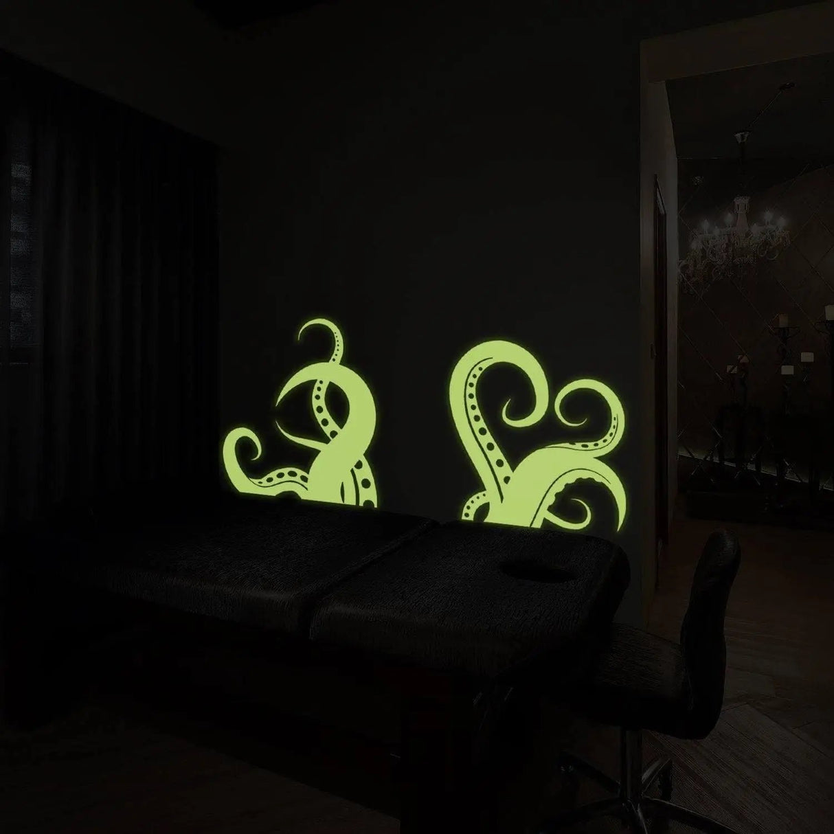 Glow-in-the-dark octopus tentacle wall stickers illuminating a dark room, adding oceanic decor to your space.