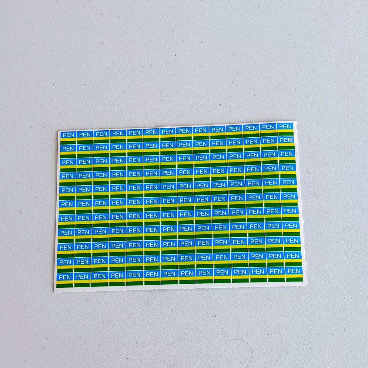 PEN electrical component labels in blue and green, featuring 154 stickers for safety and organization.
