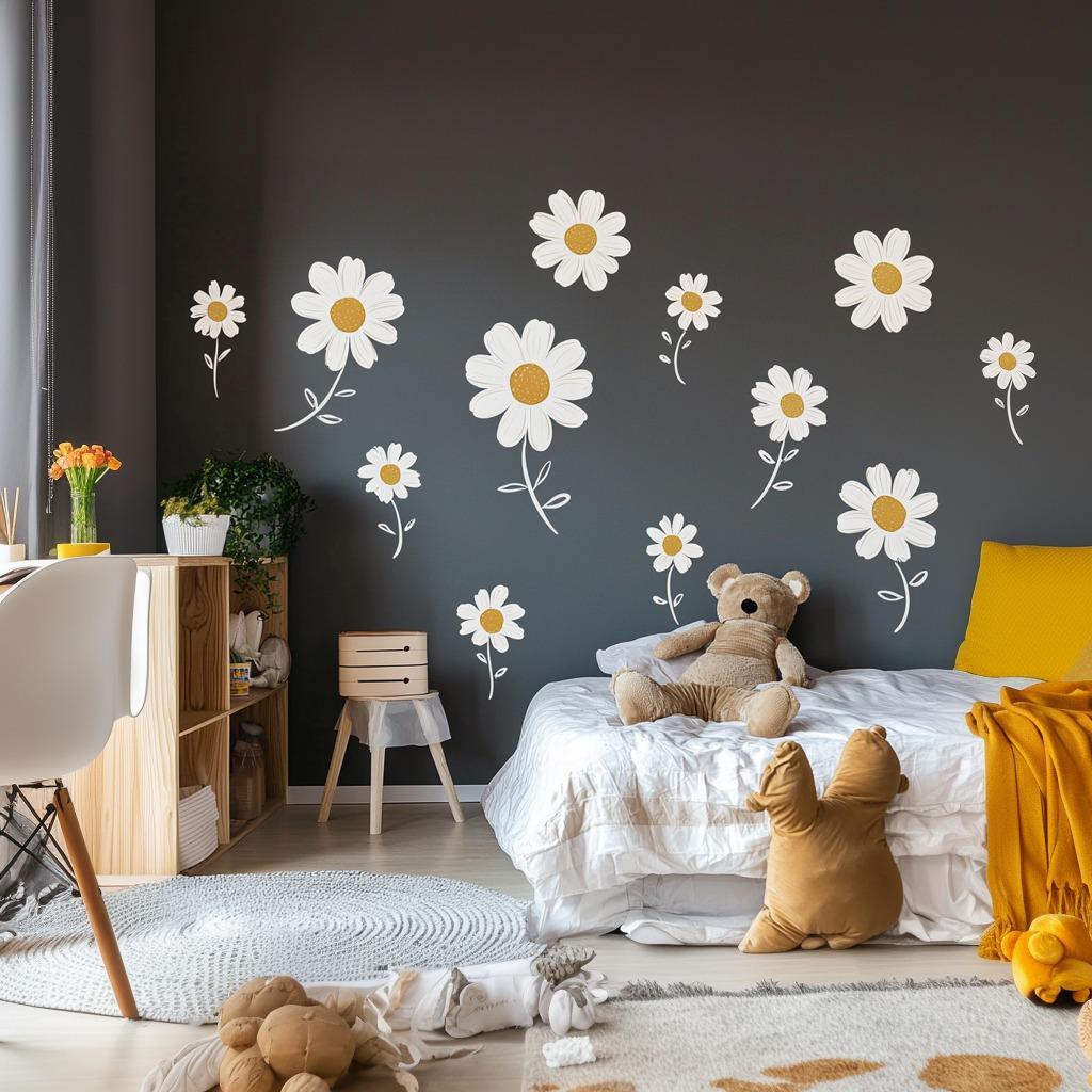 Daisy flower wall decals in a nursery with a gray wall, teddy bear, and bright bedding, creating a cheerful, playful atmosphere.