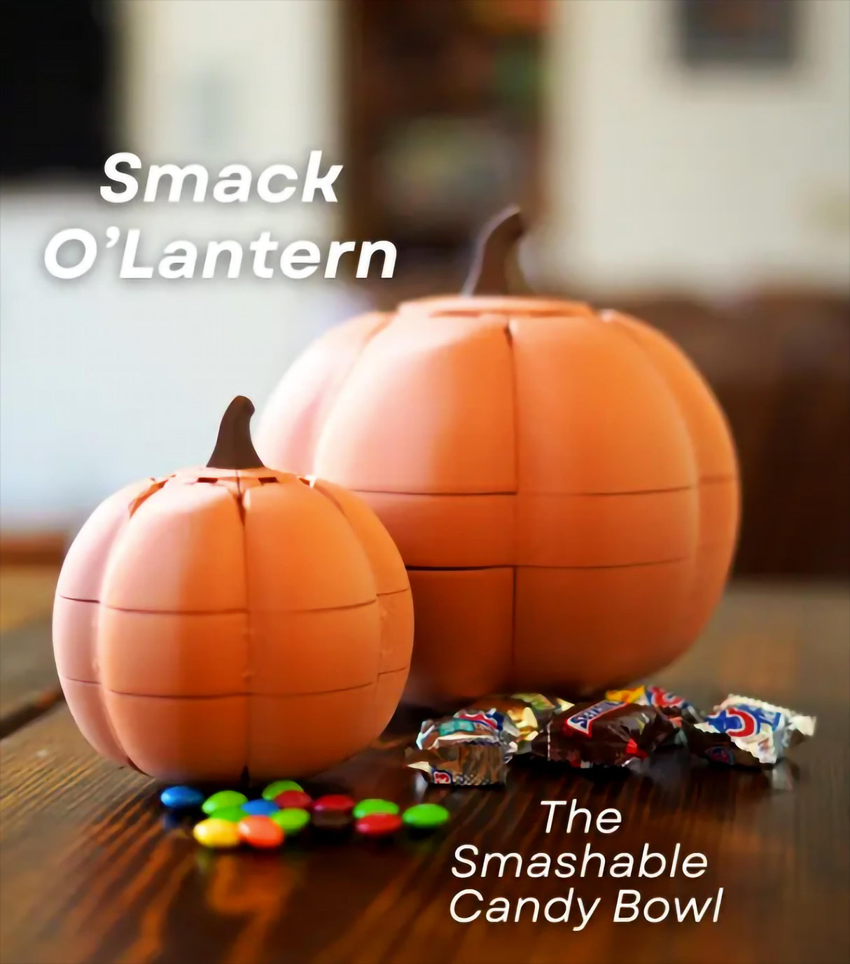 Smack O'Lantern candy bowl with colorful candies on a wooden table, perfect for Halloween treats.