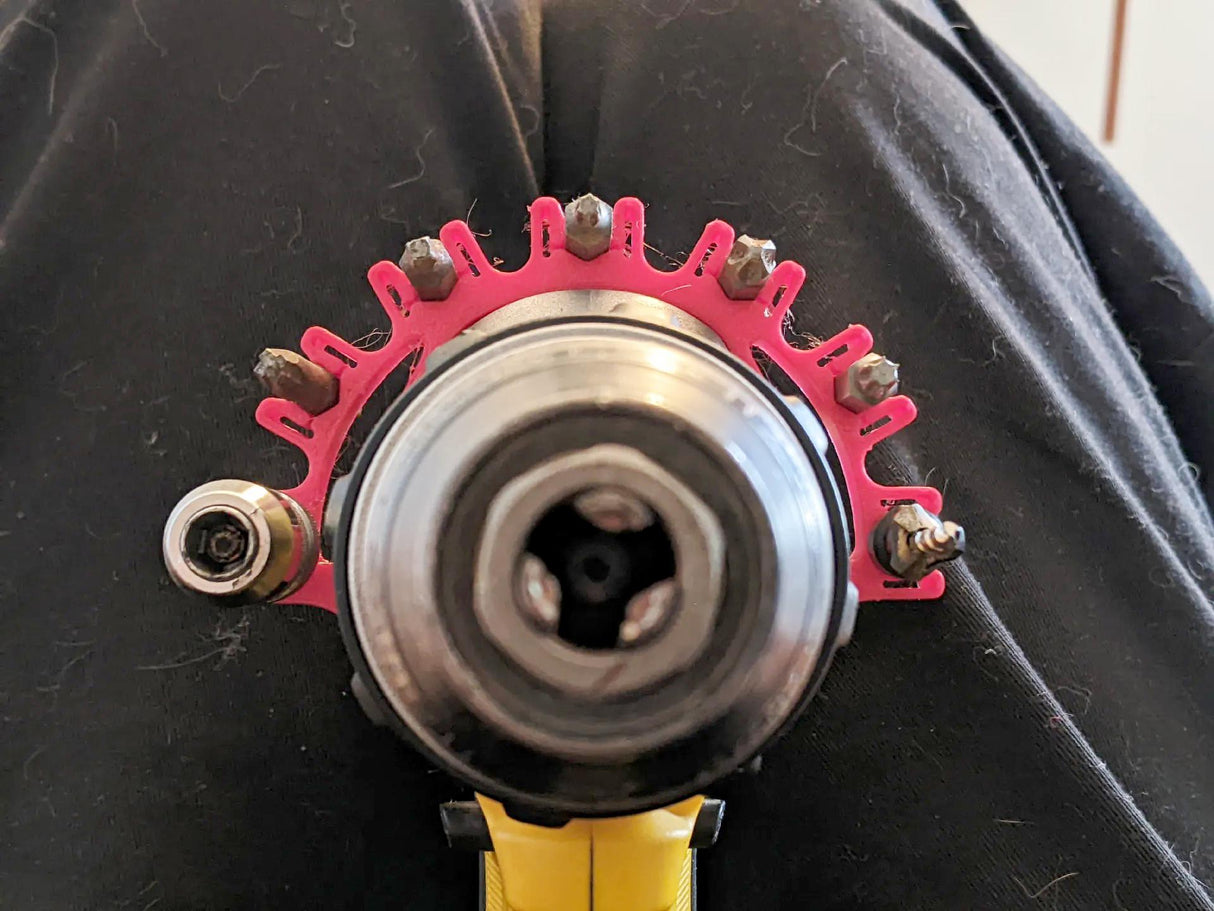 3D printed drill bit holder clip securely attached to drill, showcasing compact and organized bit storage for power tools.