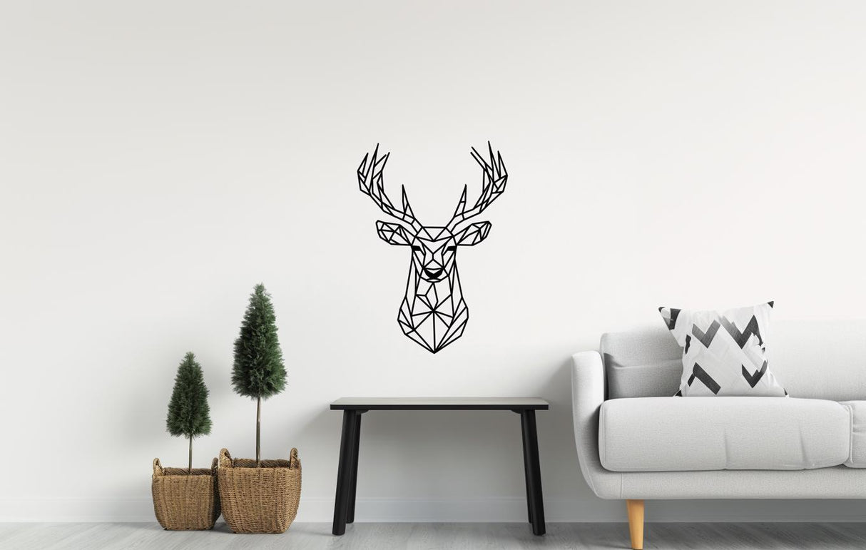Geometric deer wall decal art displayed on a minimalist living room wall with plants and modern furniture.