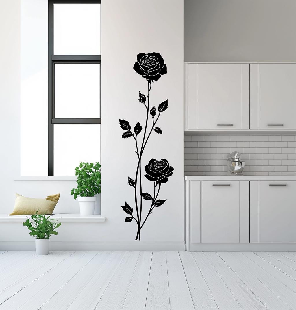 Elegant vertical rose wall decal in a modern kitchen, showcasing black silhouette roses and leaves.