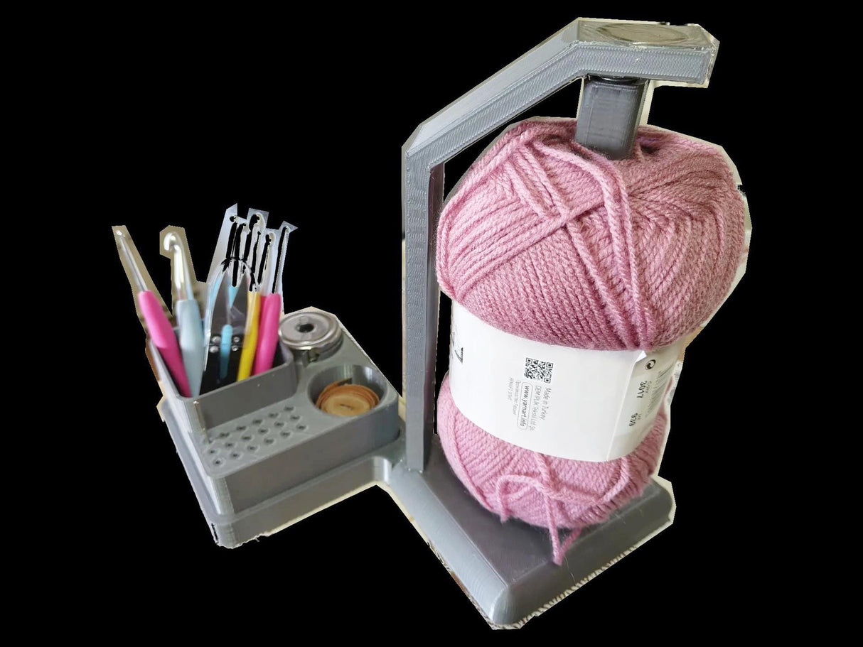 3D printed crochet tools organizer with pink yarn and hooks, enhancing your crocheting experience.