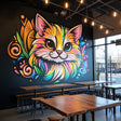 Colorful cat mural on restaurant wall with vibrant swirling patterns and expressive features, enhancing the decor.