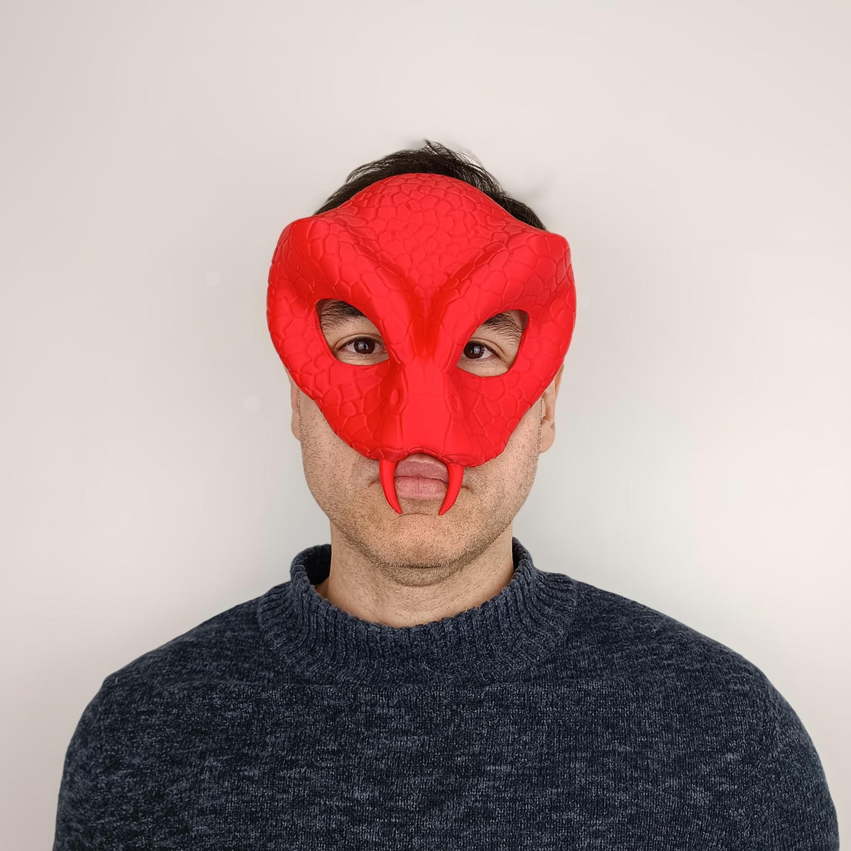 Red 3D Printed Snake Demon Mask worn by a person, featuring intricate scales and fangs for a bold Halloween look.