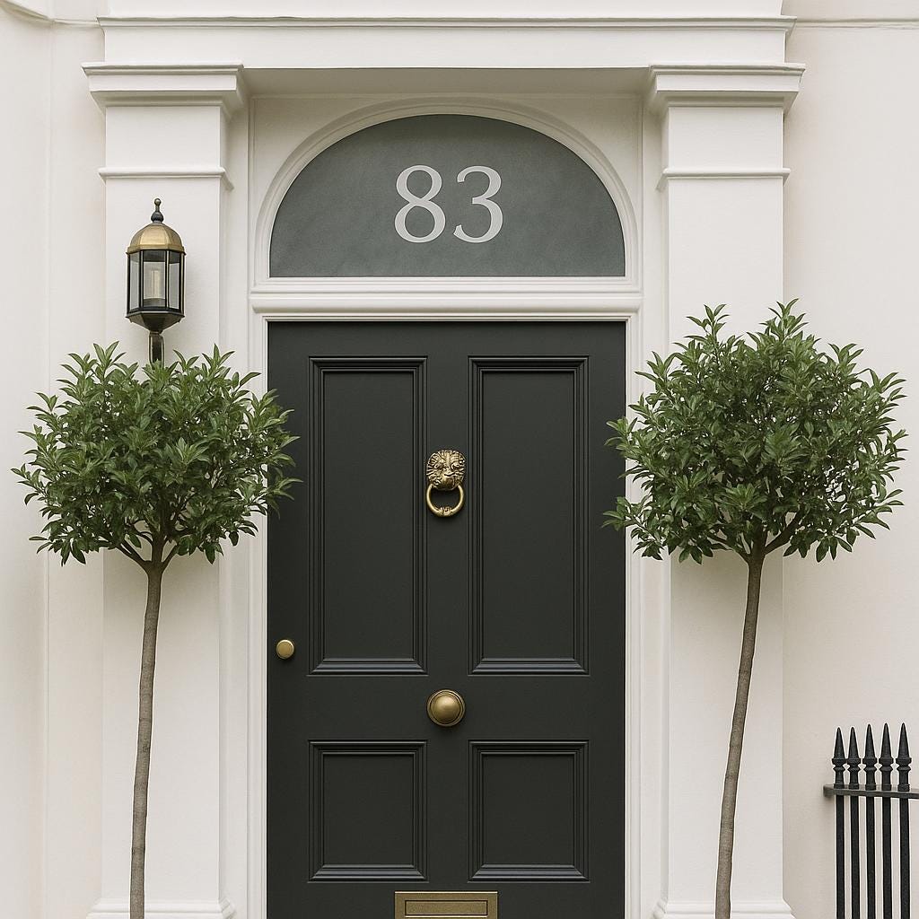 Elegant front door with number 83, featuring frosted glass fanlight and decorative planters.