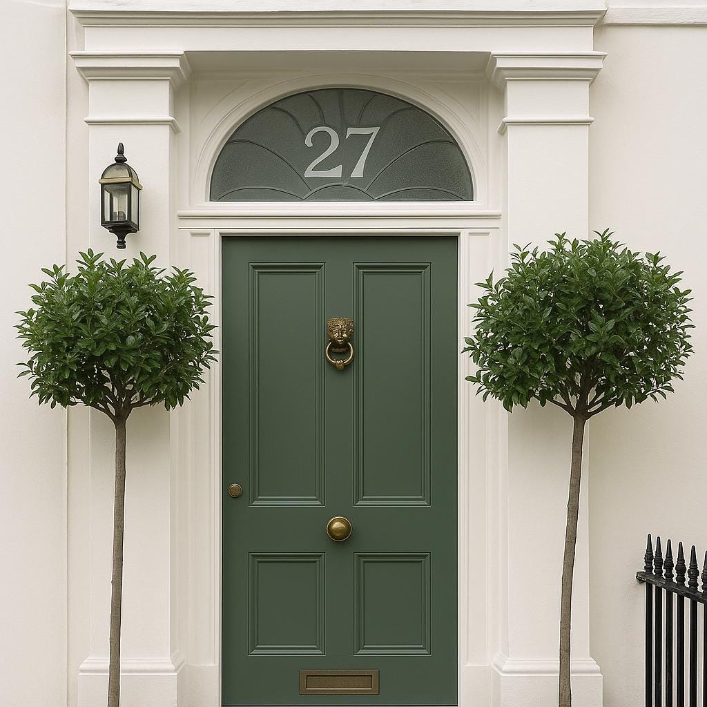 Elegant green front door with a fanlight displaying house number 27, flanked by two symmetrical topiary trees.