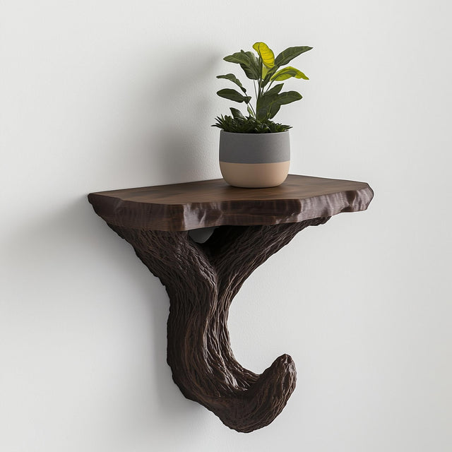 Black tree-branch style wall shelf with a potted plant, perfect for minimalist botanical decor.