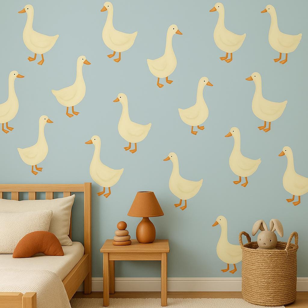 Whimsical yellow goose wall decals in a nursery with light blue walls, perfect for boho decor.