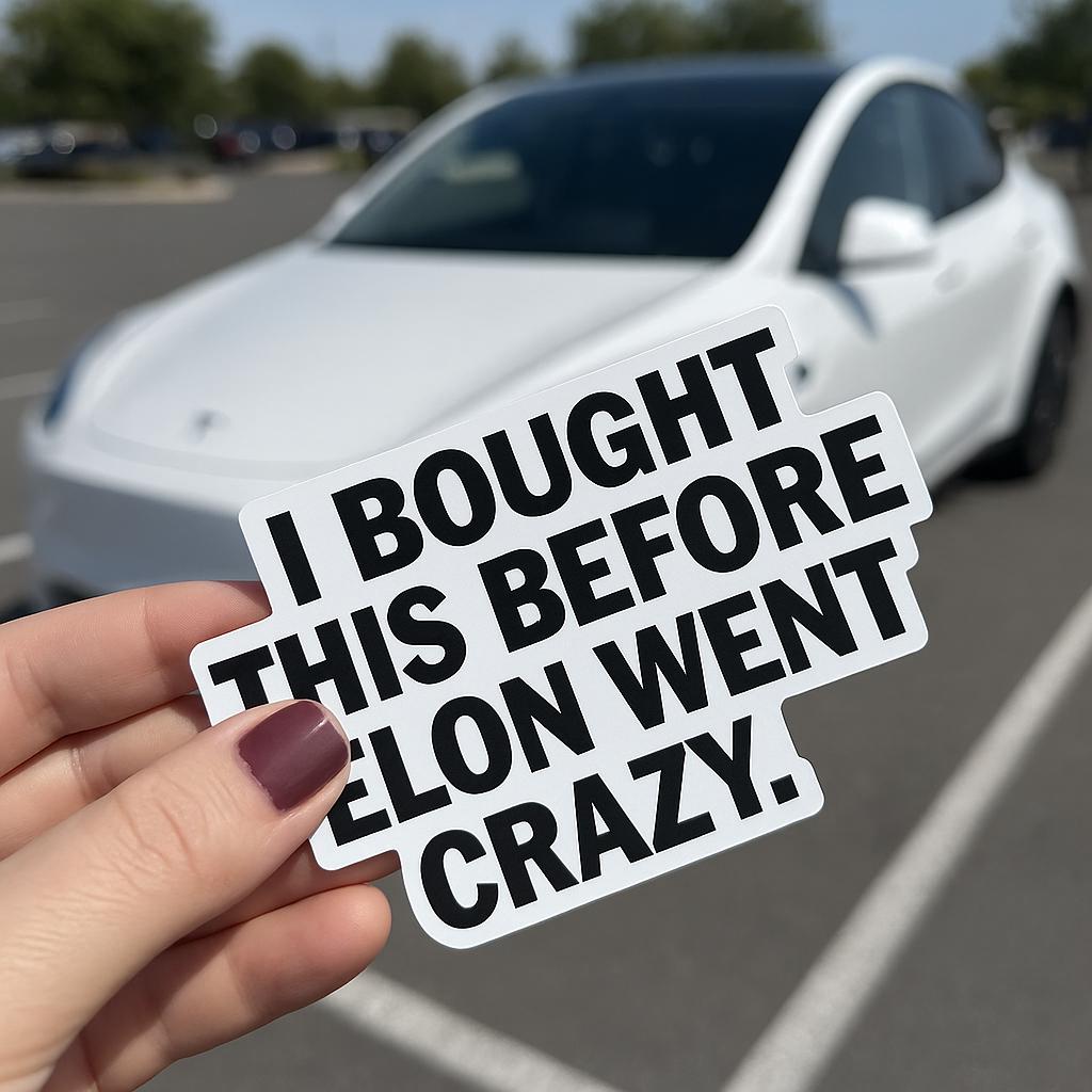 Tesla bumper sticker stating 'I Bought This Before Elon Went Crazy' held in front of a white Tesla car.