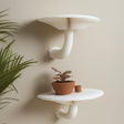 Mushroom-inspired 3D printed wall shelf set of 2 with potted plant on beige wall, featuring curved stems and organic design.