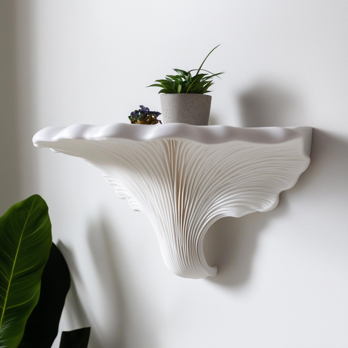 Sculptural Turkey Tail mushroom-inspired floating shelf with a potted plant, showcasing elegant wave-like textures.