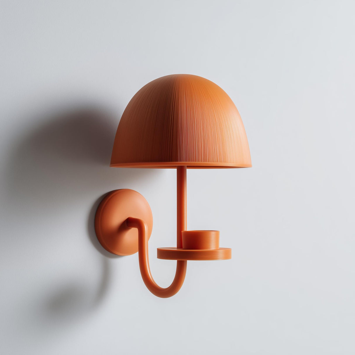 3D printed matte PLA wall-mounted mushroom shaped candle holder with a domed shade and small round platform, styled as a modern sconce on a light wall.