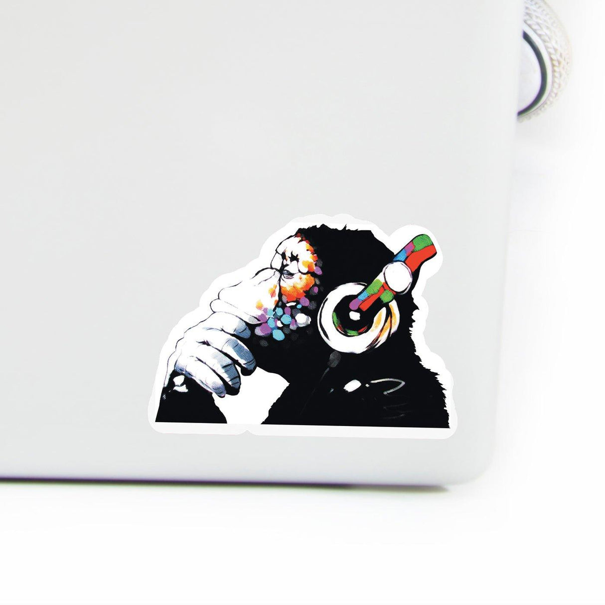 Music monkey vinyl laptop sticker featuring a chimp with headphones, adding personality to your laptop.