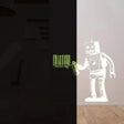 Luminescent barcode robot wall decal glowing in the dark, perfect for unique room decor.