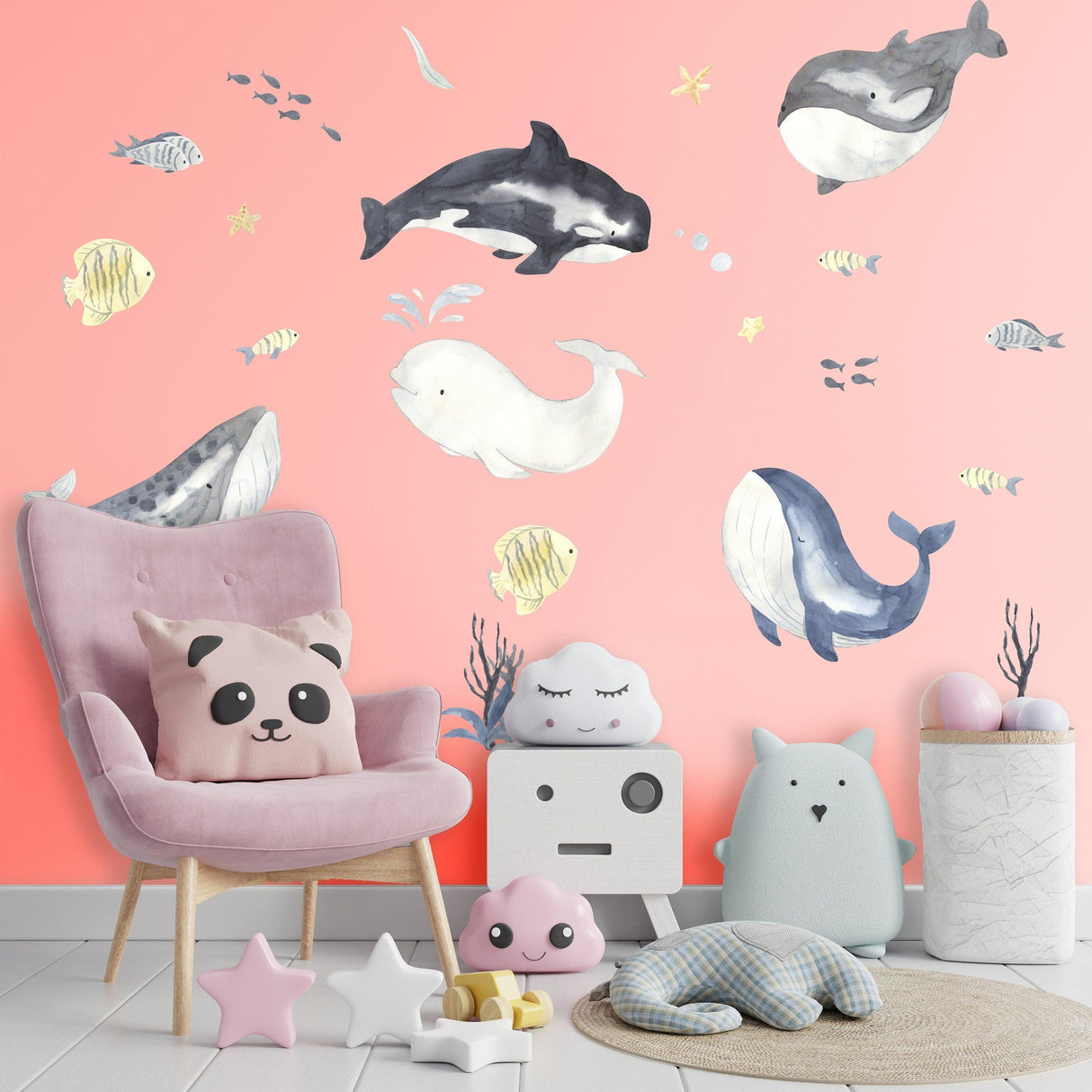 Colorful ocean themed wall stickers featuring whales and fish, ideal for children's bedrooms and nautical decor.