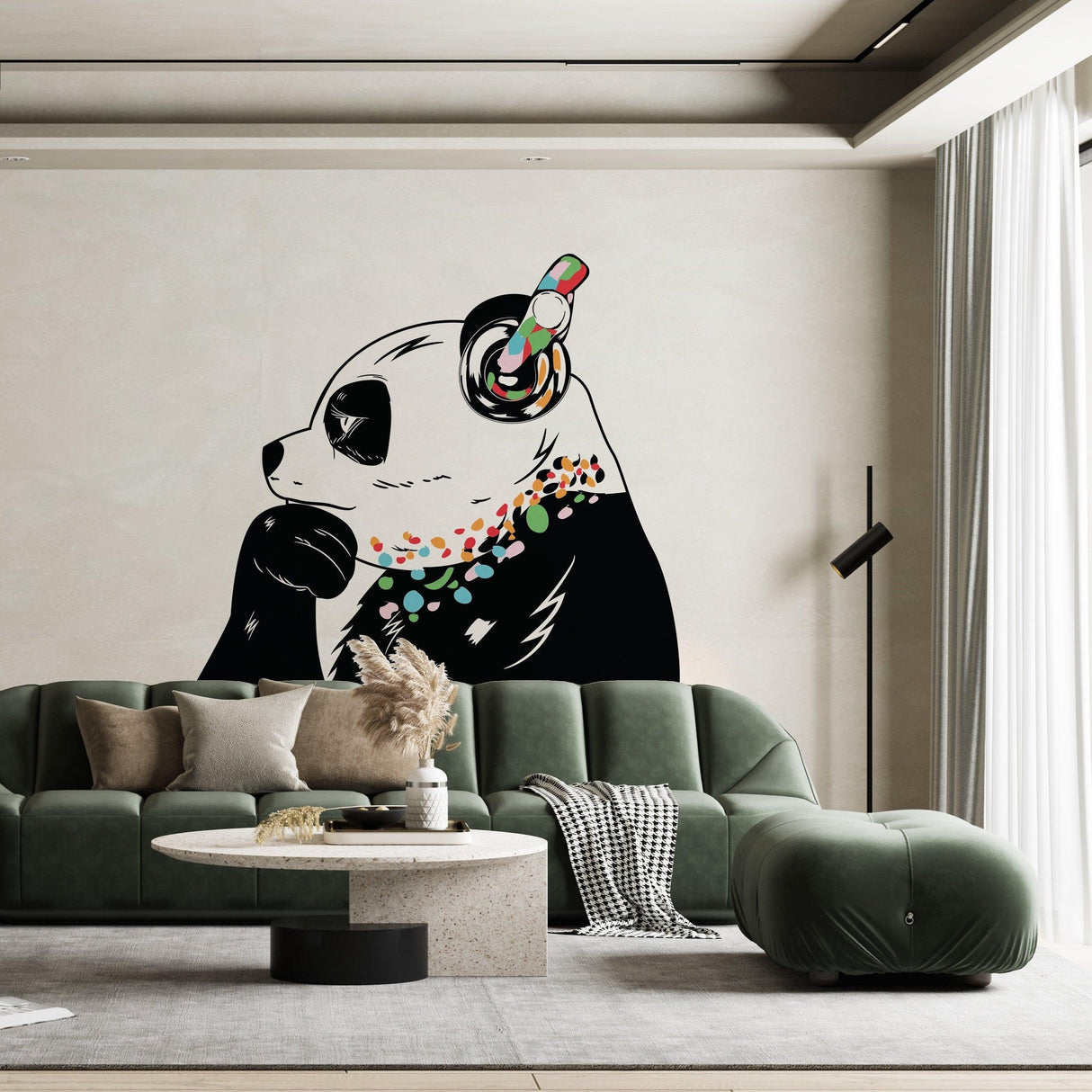 Vinyl sticker art of a panda bear with headphones on a living room wall, adding a fun and colorful decor element.