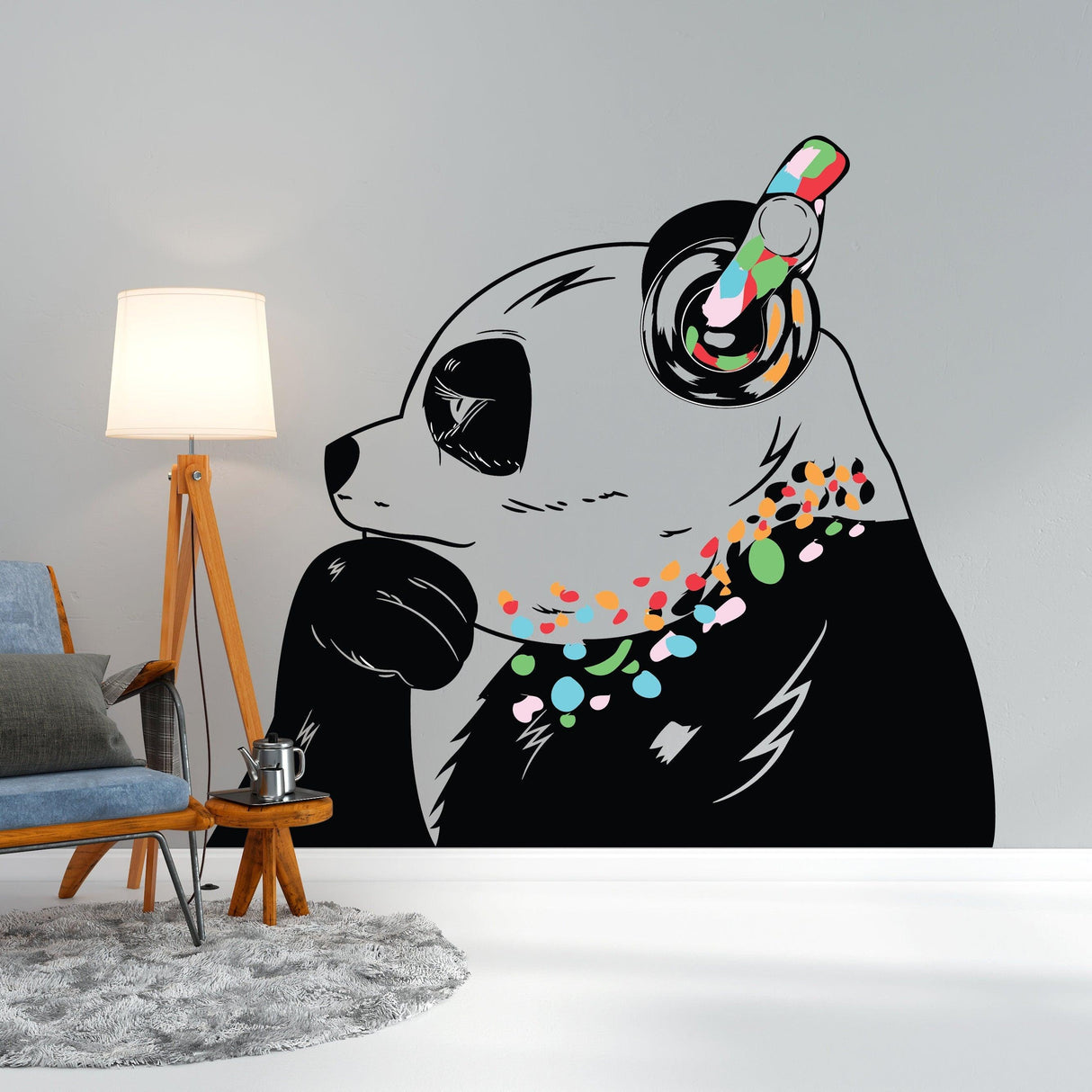 Vinyl sticker art of a panda bear wearing colorful headphones, perfect for stylish wall decor.