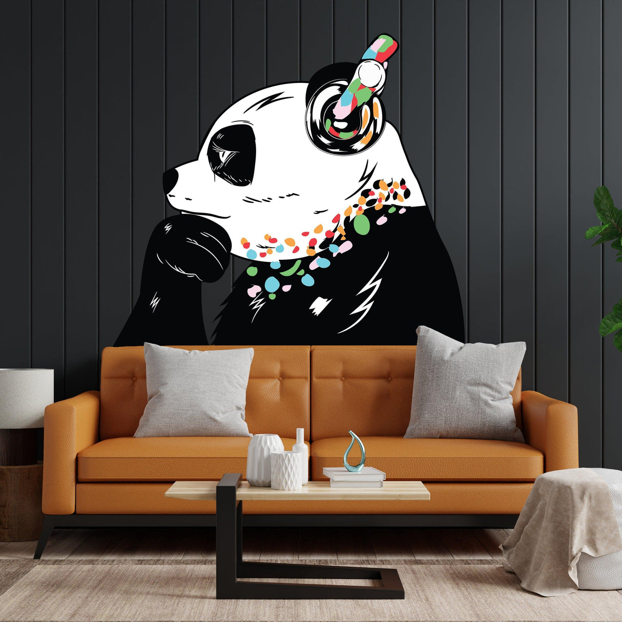 Panda bear wall decal with headphones, colorful art in a modern living room decor setting.