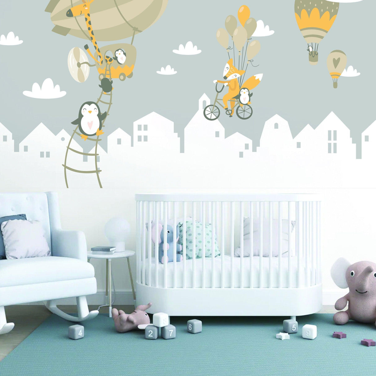 Whimsical animal wall stickers featuring penguins and a fox with balloons, perfect for a child's nursery decor.