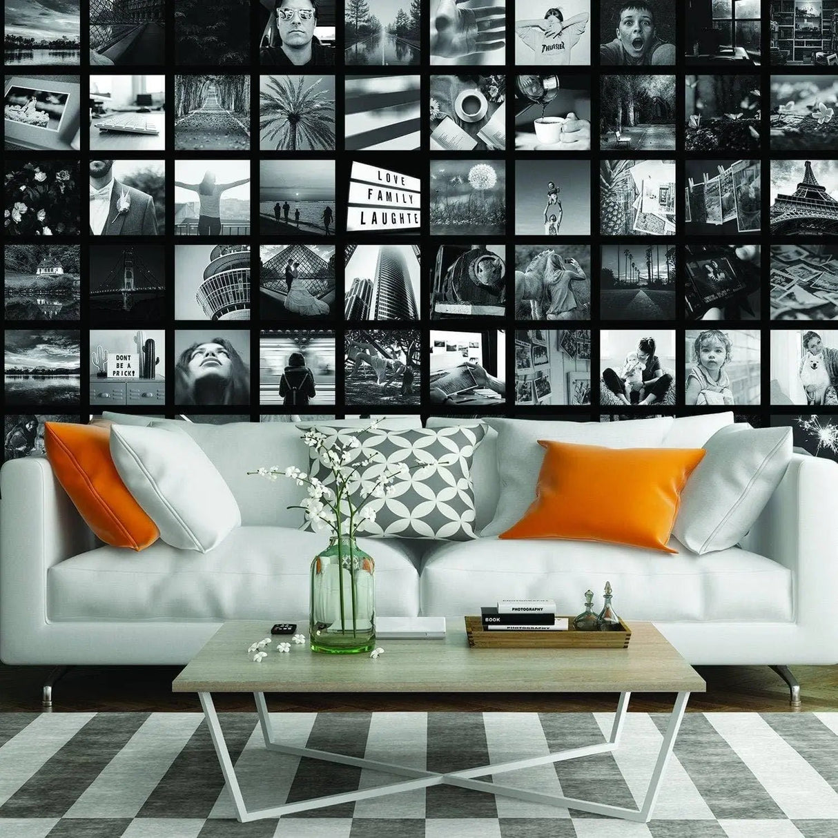 Stylish living room featuring a personalized photo collage mural as wall art above a modern white sofa with orange cushions.