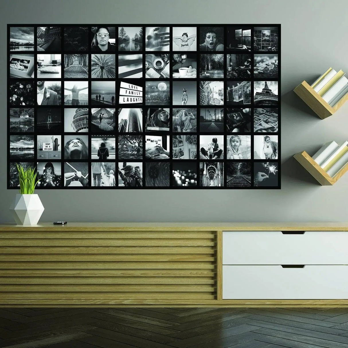 Black and white photo collage mural showcasing memories on a stylish wall in a modern living room setting.