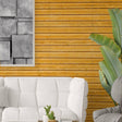 Rustic wood plank peel and stick wallpaper in a cozy living room with white couch and decorative plants.