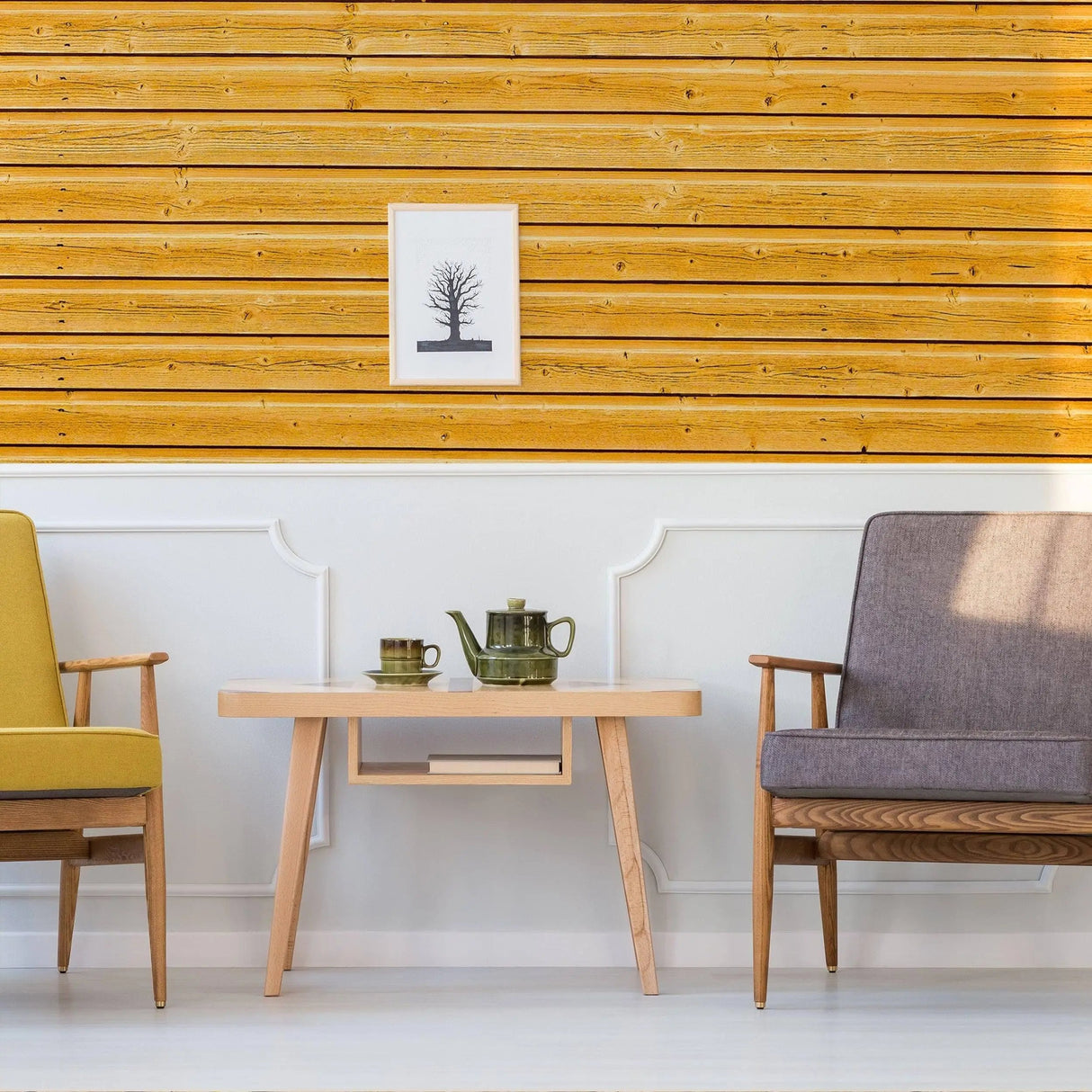Cozy living room with rustic wood plank peel and stick wallpaper, stylish chairs, and a decorative table setting.