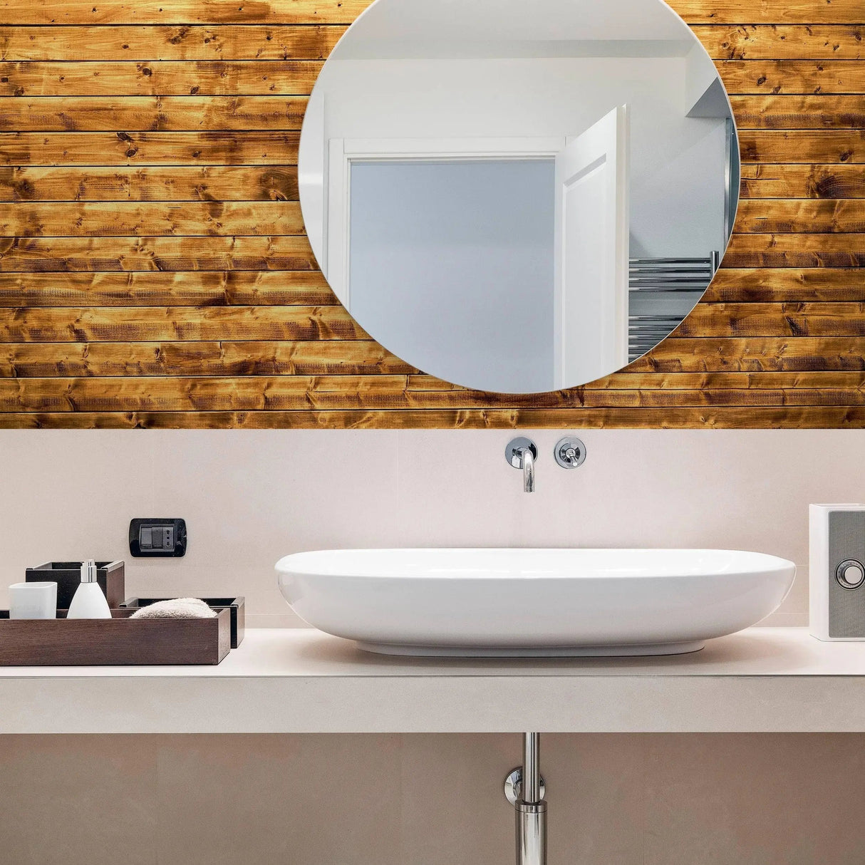 Elegant bathroom featuring self-stick rustic wood plank wallpaper and a modern round mirror above a stylish sink.