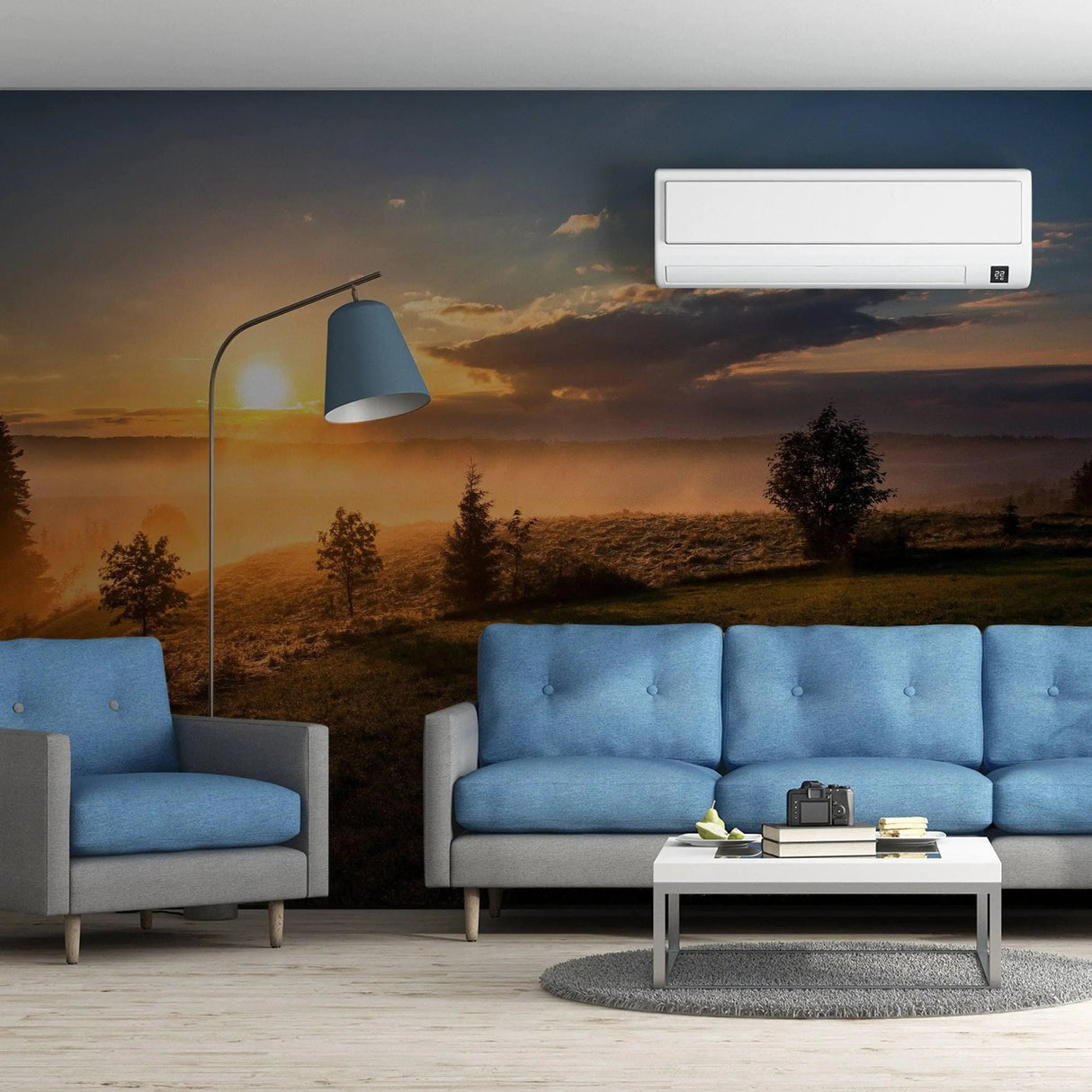 Elegant living room featuring Natural Serenade sunset wall decals, blue sofas, and modern decor for a serene ambiance.