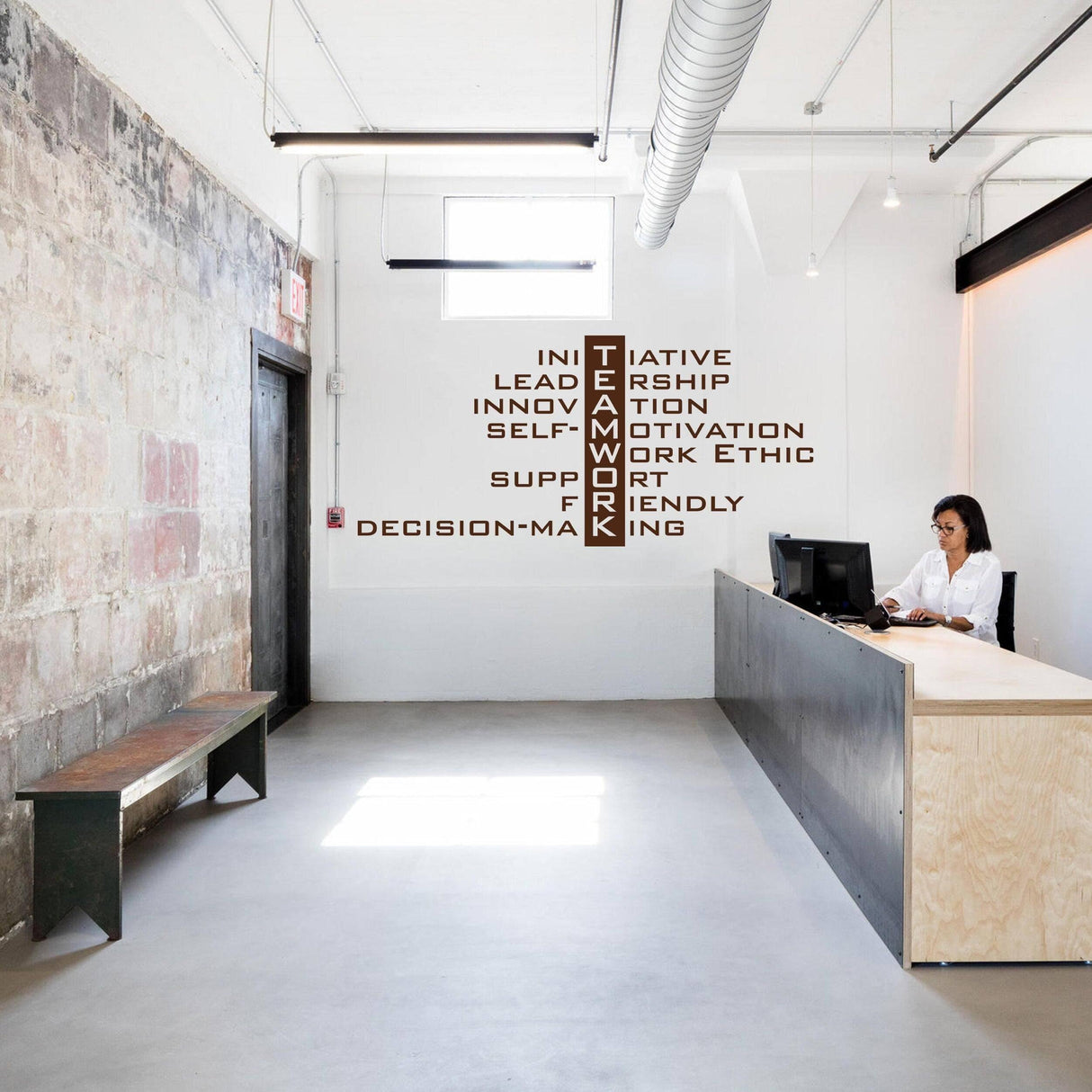 InspireX Teamwork Wall Decal in an office, showcasing vibrant design and motivational words, ideal for office decor.