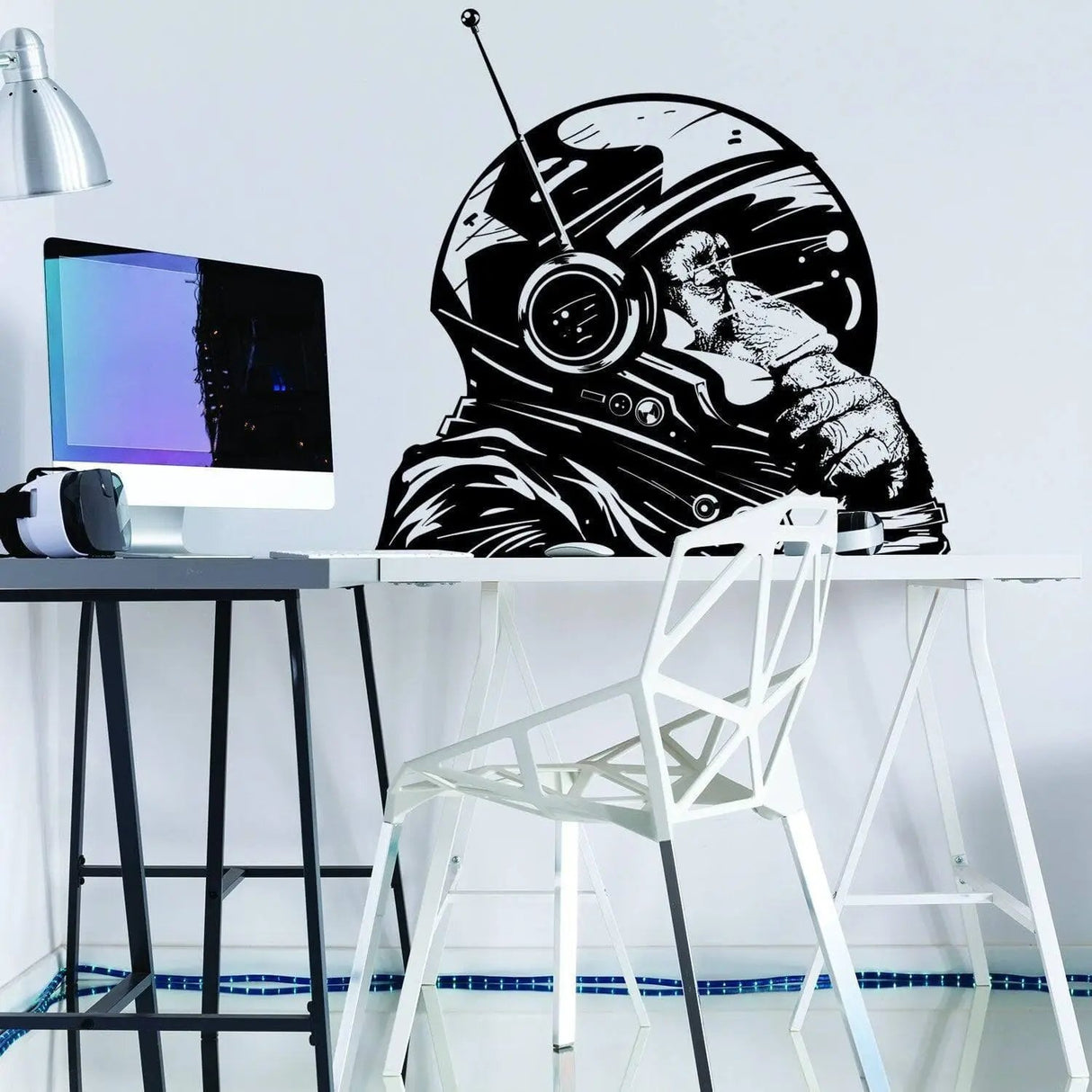 Monkey astronaut wall decal in a modern workspace, adding creativity to kid's room decor.