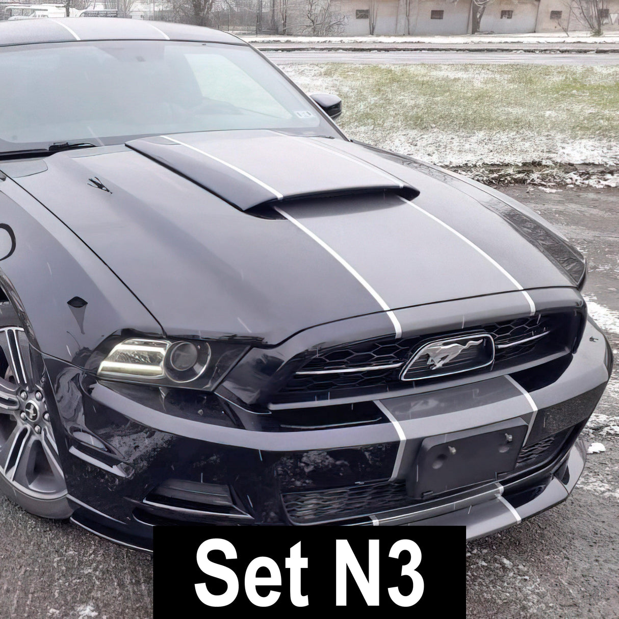 Stylish black car with white racing stripes, showcasing Set N3 racing decal design for an upgraded vehicle look.
